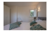 Villa Calliroe- Casa vacanze sul mare a Villasimius in Sardegna - camera da letto con finestra sul panorama.